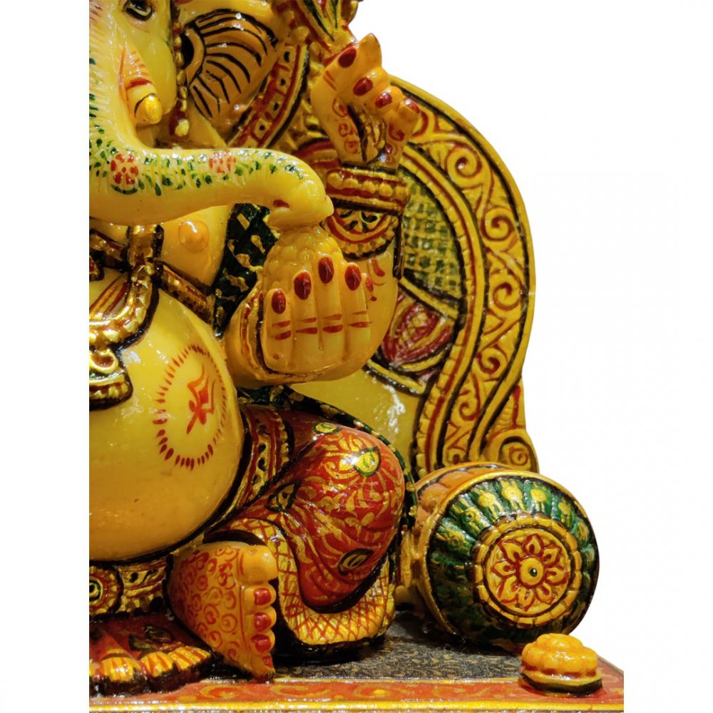 Blessing Ganesha Statue Under Ornate Canopy