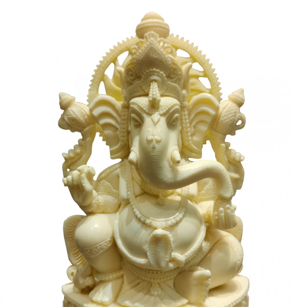 Intricate White Ganesha Statue with Divine Scenes