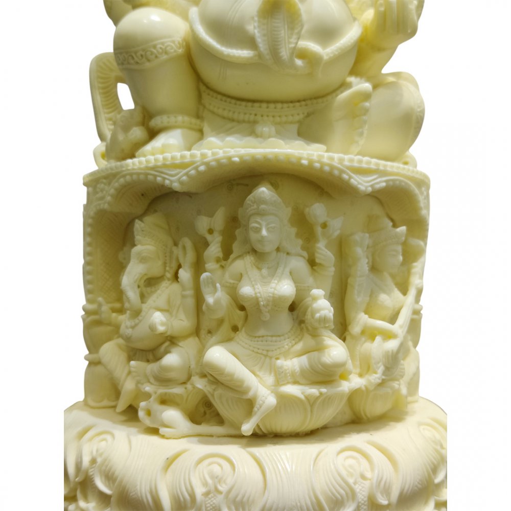 Intricate White Ganesha Statue with Divine Scenes