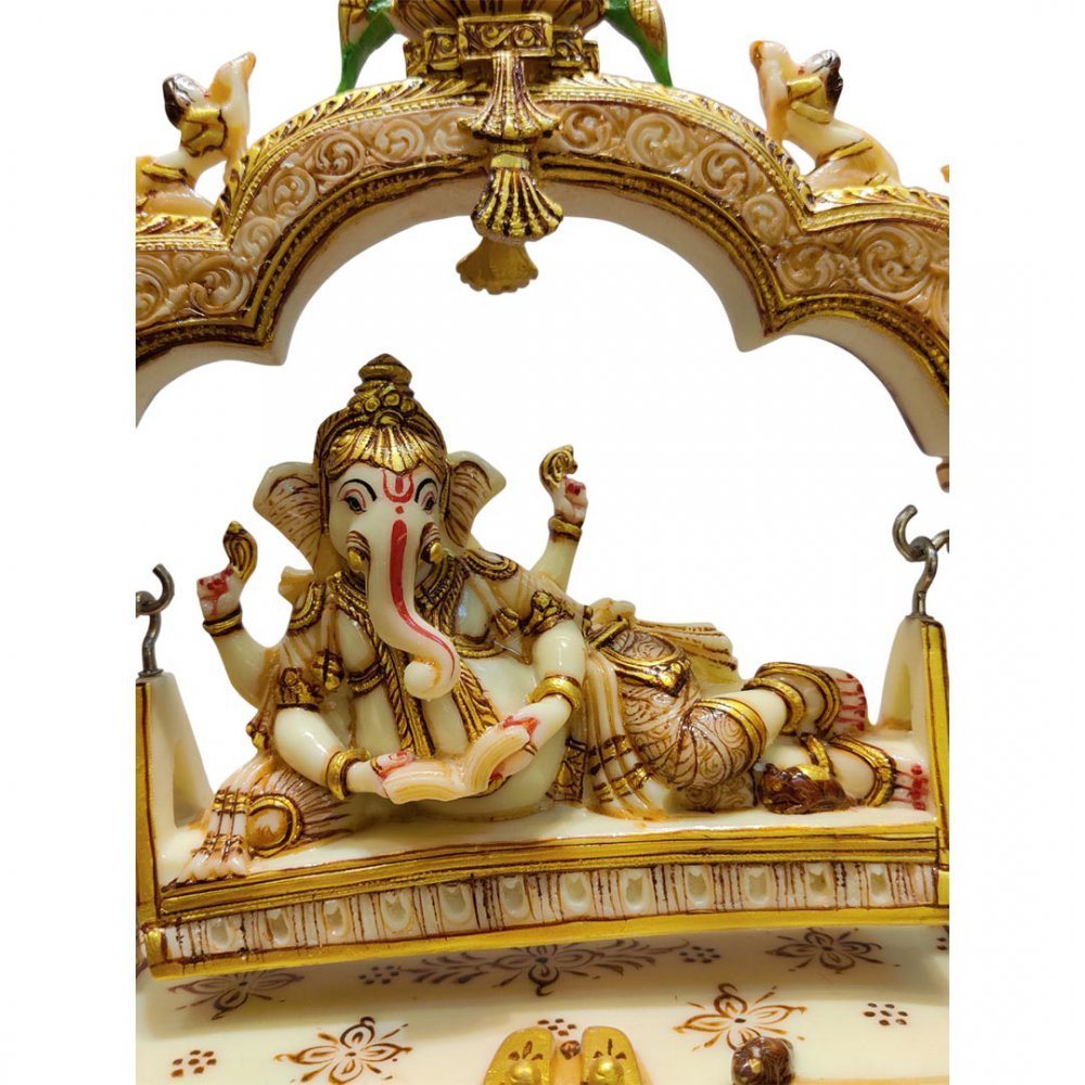 Resting Ganesha on Swing with Ornate Arch